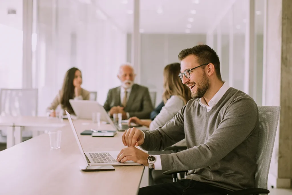 young-business-man-working-laptop-office